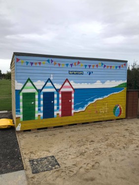 Beach Theme mural to large Shed at Buttercups Nursery School Huntsworth