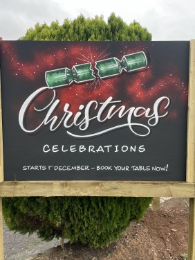 Book now for Christmas at The Compass Tavern - large chalkboard