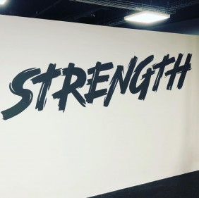 Large hand painted writing on gym wall / Bridgwater