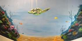 Under the Sea mural painted on children's bathroom at Nursery Bridgwater