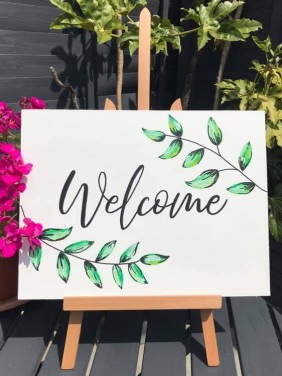 Wooden Wedding Welcome Sign on White with all hand painted with leaves