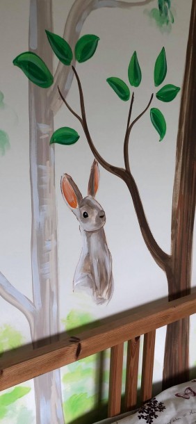 Woodland mural / rabbit in childs bedroom